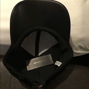 BCBG hat. Never worn, in excellent condition. Adjustable strap.